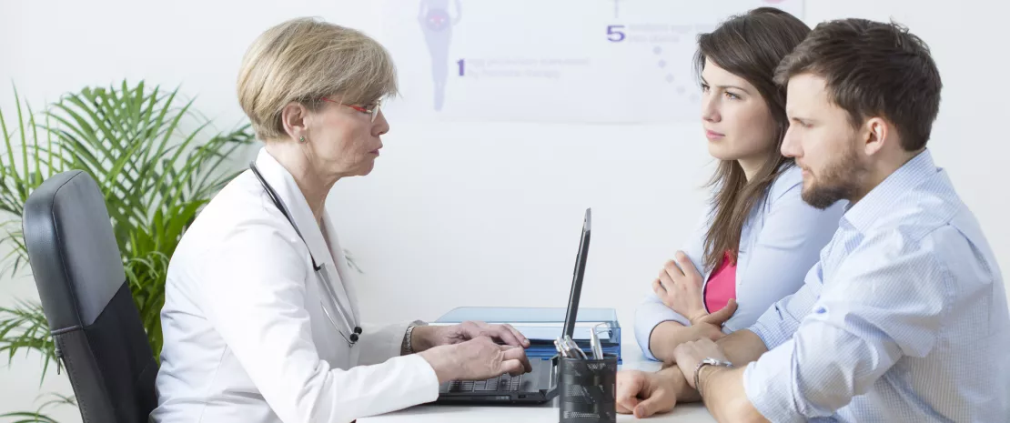 Doctor talking to patients